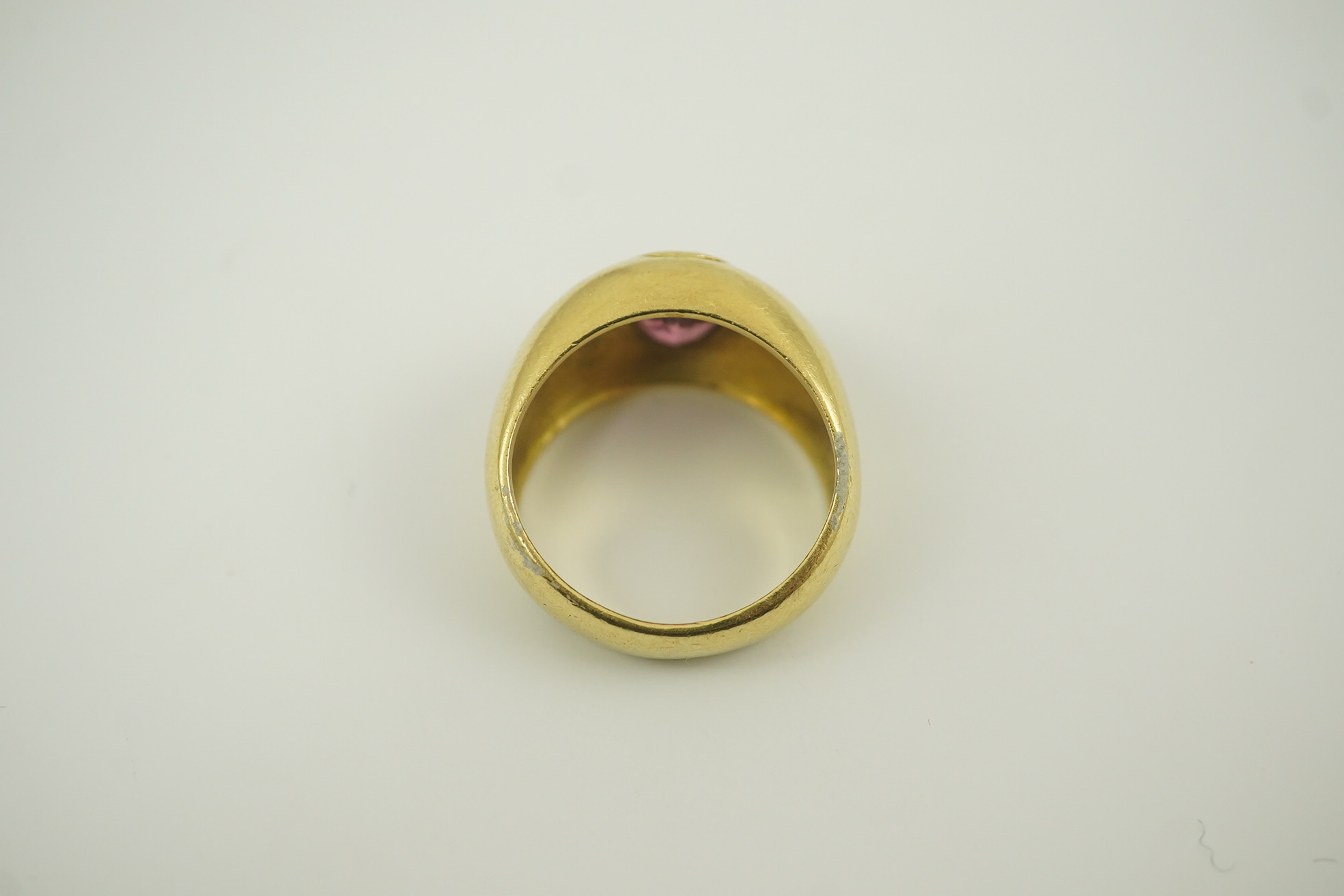 A modern Mappin & Webb 18ct gold and gypsy set pink tourmaline and blue sapphire set dress ring